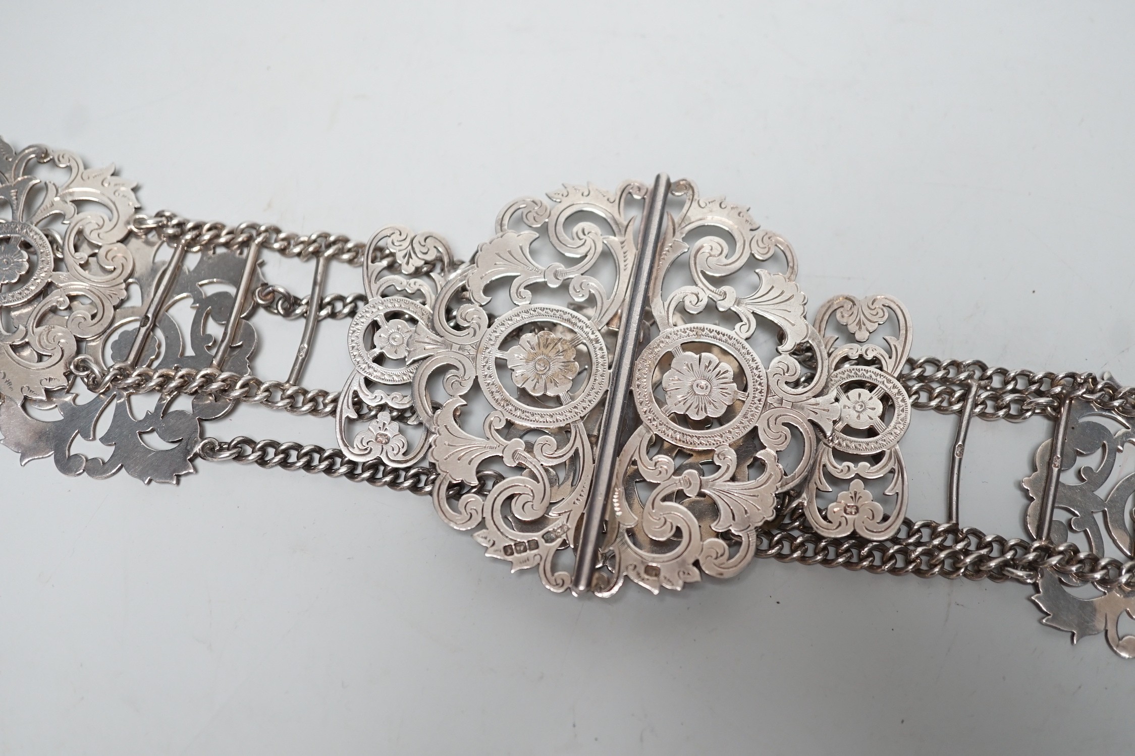 A late Victorian pierced silver belt, with chain links, James Dixon & Sons, Sheffield, 1898, overall 59.6cm.